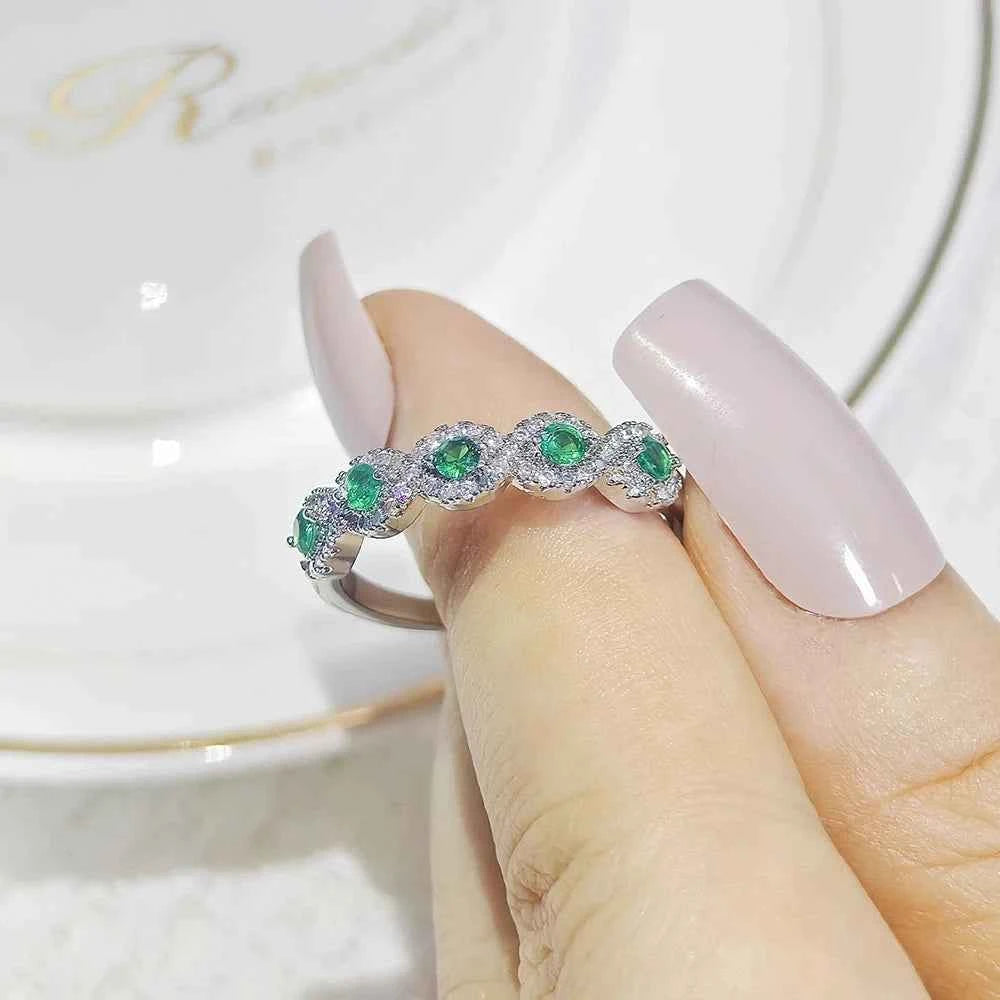 Green zircon eternity Rings