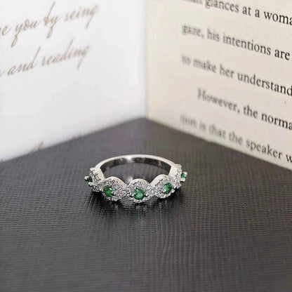 Green zircon eternity Rings