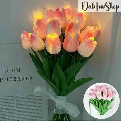 LED tulips bouquet with soft pink petals and green leaves, perfect for home decor