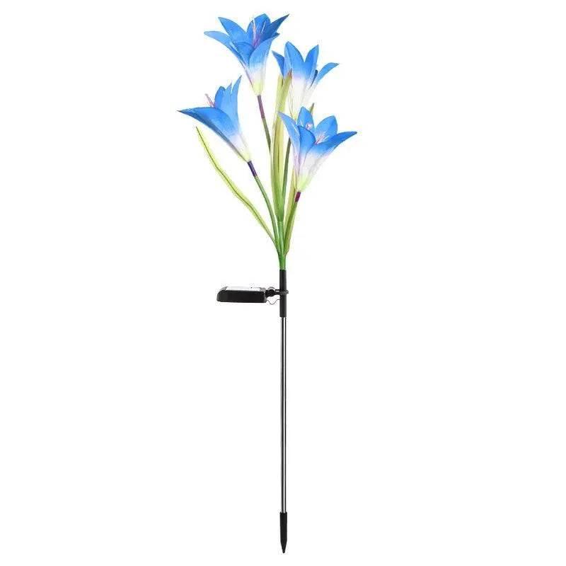 Outdoor solar lily garden lights featuring vibrant blue flowers on a sleek stake for landscape illumination